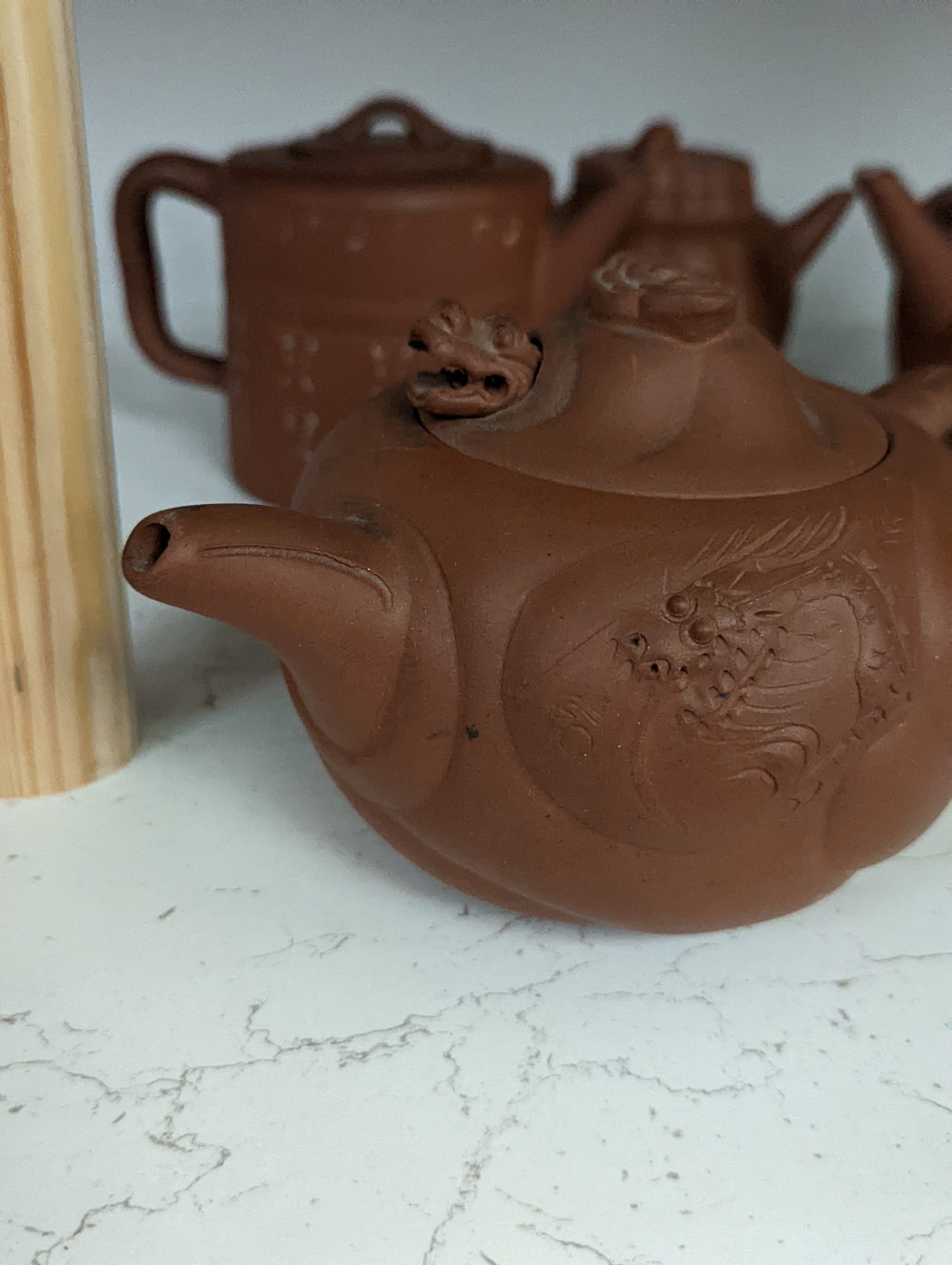 Six Chinese Yixing teapots, tallest 11cm